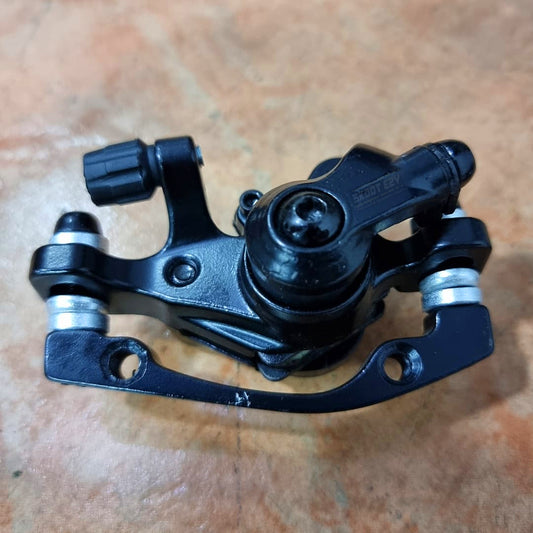 In a disc-brake system, the brake caliper is crucial. It serves as a support bracket for the brake pads on either side of the rotor, as well as the caliper bracket. The objective of a brake caliper is to squeeze the brake pads against the rotor in order to bring the electric bicycle to a halt.