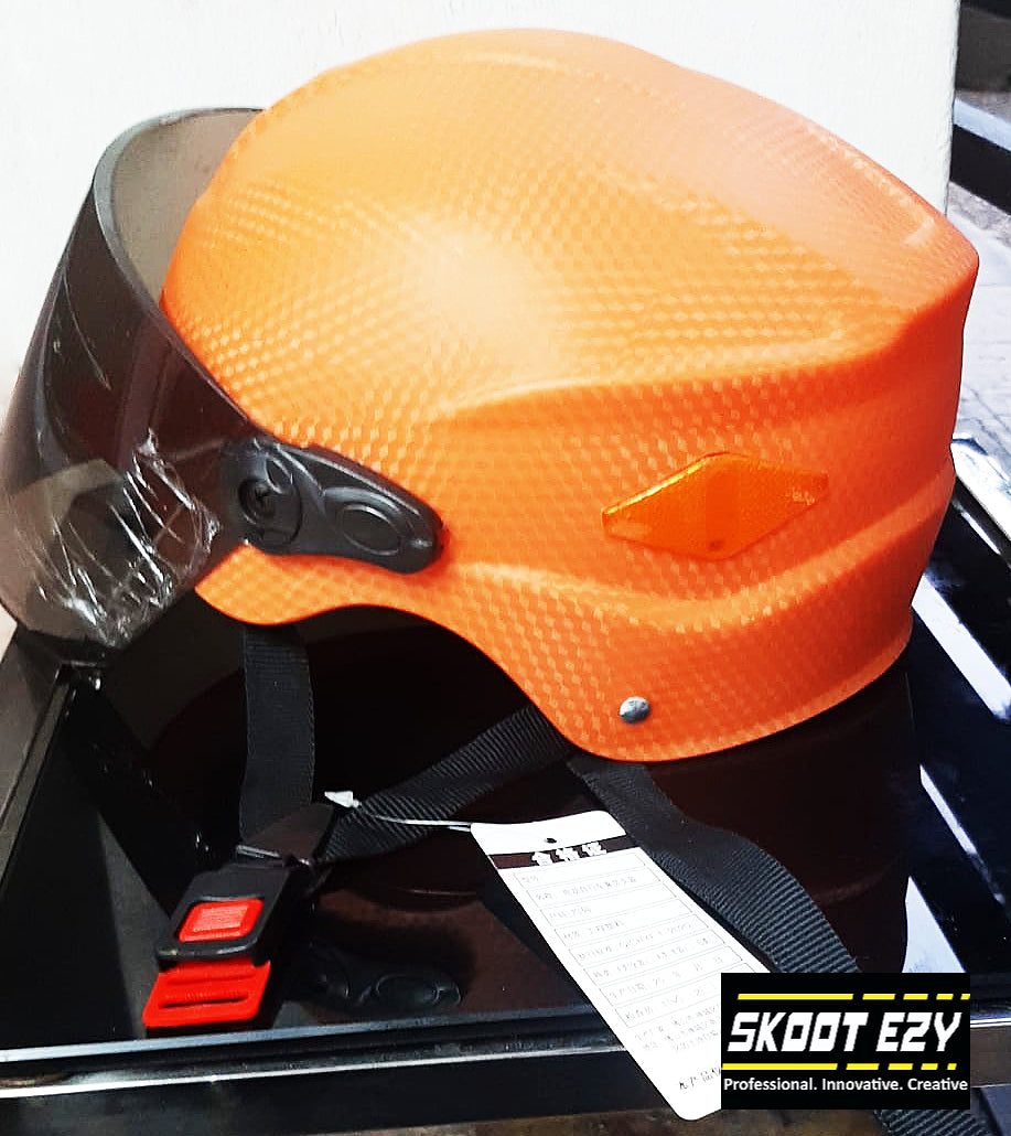 This orange half helmet is made from Acrylonitrile Butadiene Styrene (ABS) impact resistant thermoplastic. The ABS material is an excellent choice for a helmet because it can withstand extreme temperatures without warping or cracking.